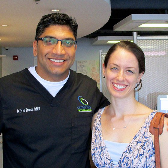 Dr. Thomas with a smiling woman