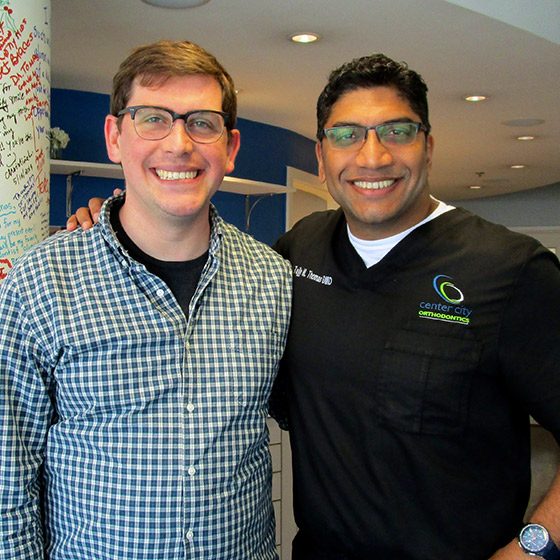 Dr. Thomas with a patient