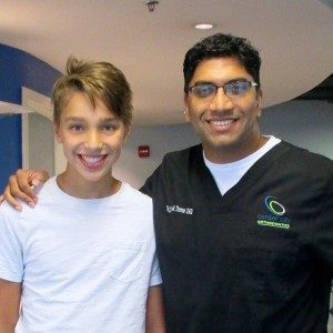 Dr. Thomas with a patient