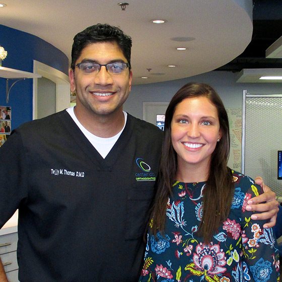 Dr. Thomas with a patient