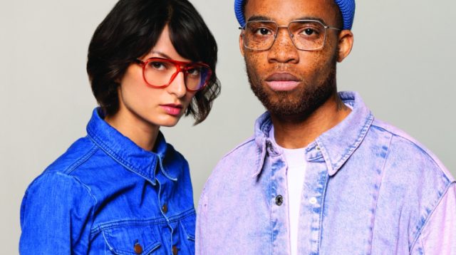 Two people wearing Stepper frames
